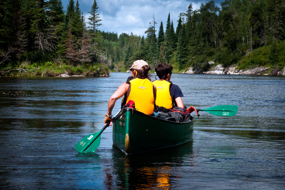 Canoeing in open, blue water
